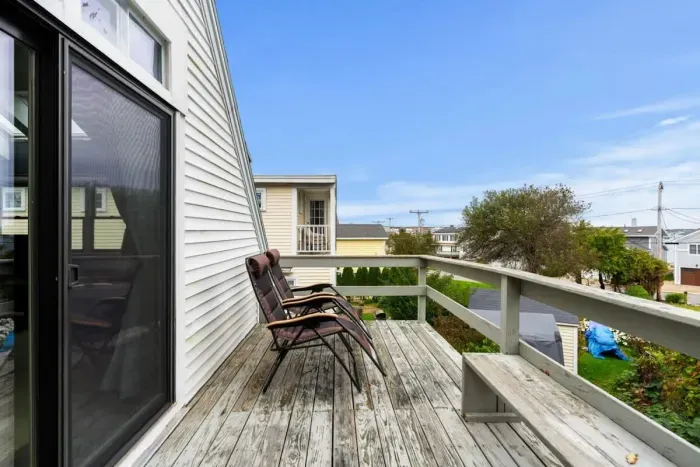 Private deck & roof deck (not to be accessed from Nov-Apr for liability reasons), accessed from the master bedroom, with views of the Atlantic Ocean