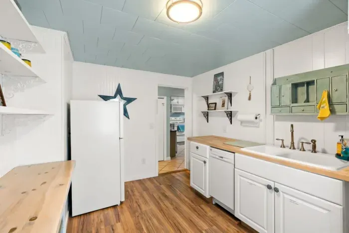 Fully equipped and stocked kitchen with stackable washer/dryer in-house.