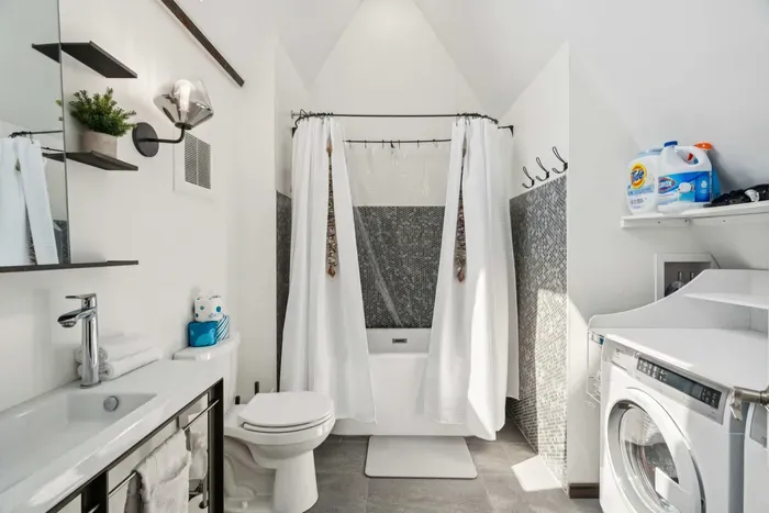 Bathroom with a full-size tub