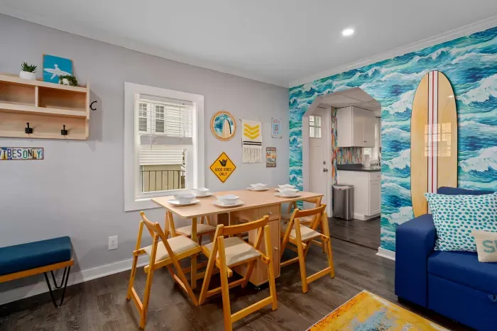 Living room with foldable 6-person dining room table set up