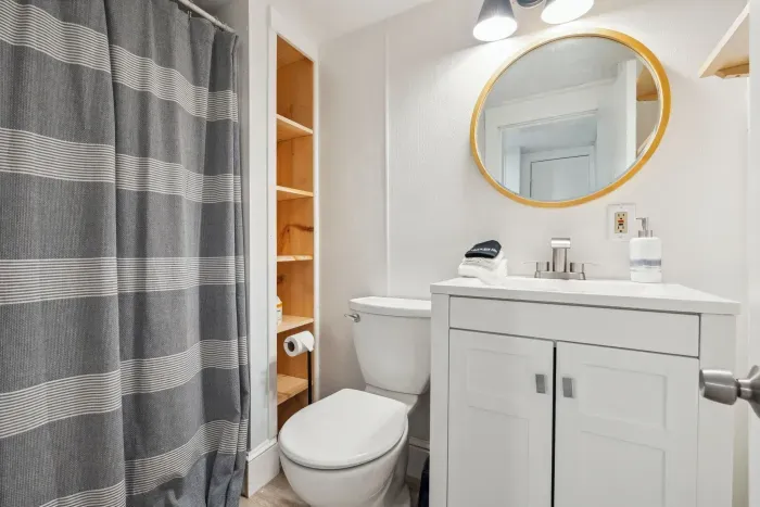 Redesigned bathroom with clean towels provided! Stand up shower