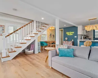 Colorful open-concept living room at a pet-friendly NH vacation rental