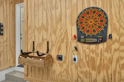 3 car garages with high speed charger for e-vehicles and table tennis and beach chairs and umbrellas