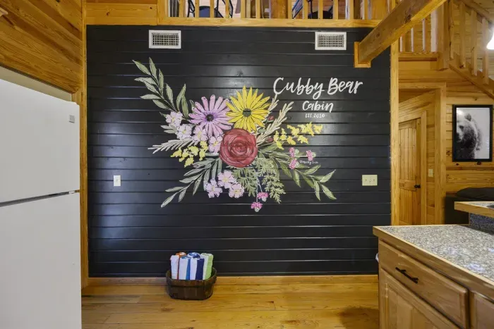Picture perfect moment in front of our custom mural!