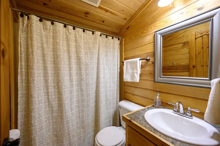 Third bathroom upstairs off the loft with a tub/shower