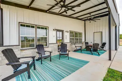 Large covered front porch for sunset views