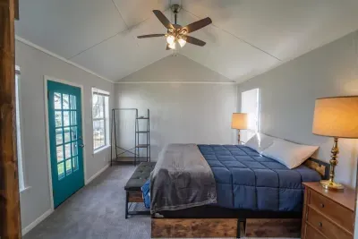 Roomy main bedroom offers direct lake access.  Enjoy getting up in the morning and feeling the lake breeze from the bedroom entry way.