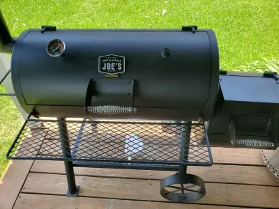 Enjoy this Oklahoma Joe's charcoal grill.  A charcoal chimney is also available to get your fire going fast.