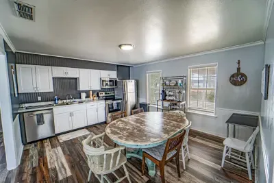 New stainless steel appliances highlight remodeled kitchen.  Coffee station gets your morning started off right.