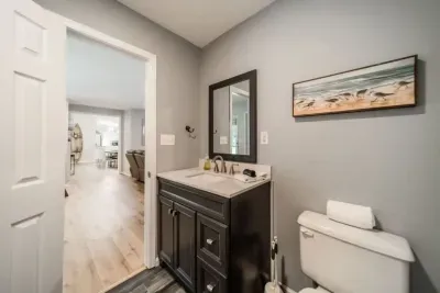 Bathroom conveniently located for fourth bedroom and bunk bed area
