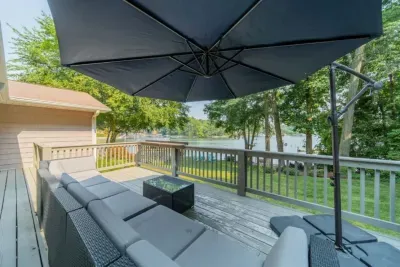 Deck Retreat: Sip drinks under the parasol while soaking in stunning waterfront views