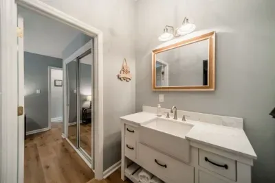 Bathroom that's conveniently located next to secondary bedrooms and common spaces