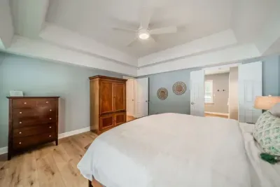 Primary Bedroom: Relax in our king sized bed with TV
