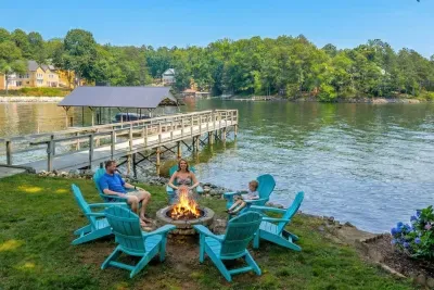 Gather around the fire pit with stunning lake views and Adirondack seating