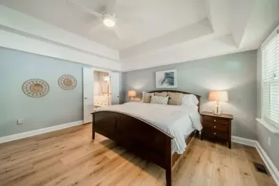 Primary Bedroom: Relax in our king sized bed with TV