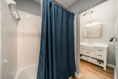 Bathroom that's conveniently located next to secondary bedrooms and common spaces