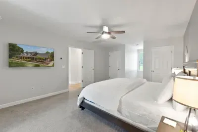 This second-floor bedroom has a cozy office nook… perfect for work or winding down.