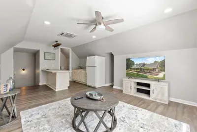 A standout feature is the private apartment-style space with its own living room, kitchenette, and king bedroom… ideal for couples seeking extra privacy and comfort.