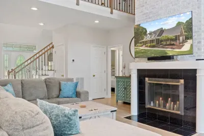 The spacious living room and plush sofa create the perfect spot to gather, relax, and share unforgettable moments indoors!