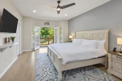 Wake up refreshed in the primary bedroom to serene views of the backyard and the lake… nature's perfect start to your day!