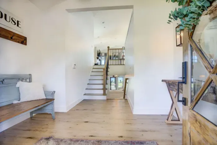 Split level entry which does require going up or down stairs. Commercial grade wheelchair lift available on the back of the property.