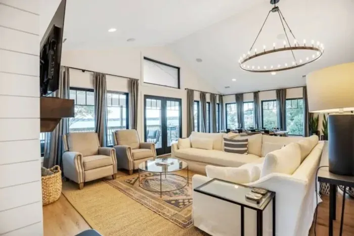 Open floor plan with deep water views, built in fireplace, and top of the line Sony HDTV.