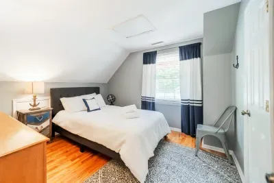 The upstairs has a bedroom with Queen-sized bed, closet and TV.  Feels like a hideaway!