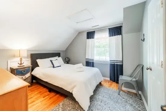 The upstairs has a bedroom with Queen-sized bed, closet and TV.  Feels like a hideaway!