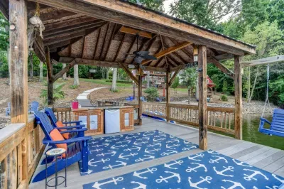 The dock features a covered seating area with refrigerator.  Perfect to keep drinks cold and enjoy the lake in comfort!