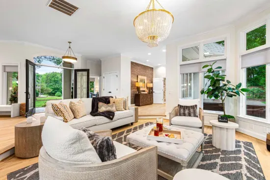 Our sunroom features lots of seating and is surrounded by windows.  Perfect for watching nature while having morning coffee.