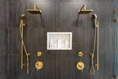 Primary bathroom features a large shower with dual shower heads and seating.