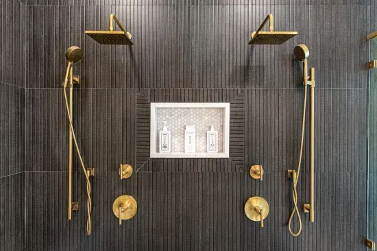 Primary bathroom features a large shower with dual shower heads and seating.