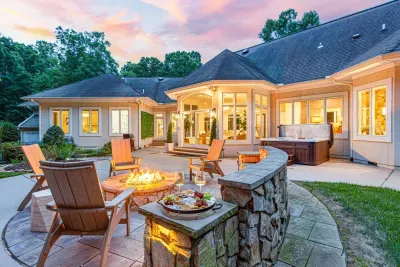 Outdoor patio area features the beautiful fire pit, perfect for long conversations under the stars.