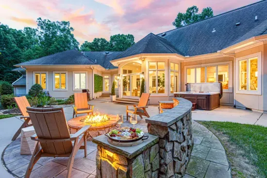 Outdoor patio area features the beautiful fire pit, perfect for long conversations under the stars.