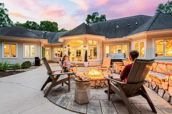 Enjoy our expansive backyard with firepit, hot tub, outdoor dining, cornhole, and more.