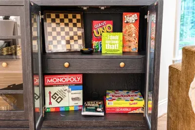 Our side table is filled with games that the whole family can enjoy.