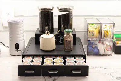 A full coffee bar is available to guests with filtered coffee, coffee pods, and a variety of sweeteners.