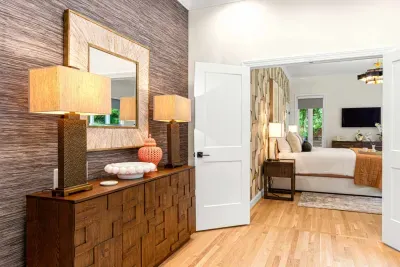 Walk through the double doors and enter the huge primary bedroom.