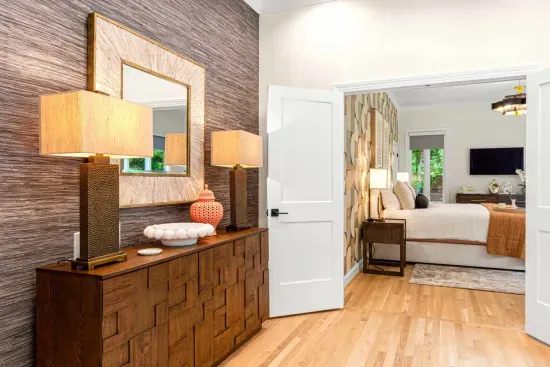 Walk through the double doors and enter the huge primary bedroom.