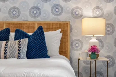 Another large bedroom is located on the lower level with a queen bed, walk-in closet, and ensuite bathroom.