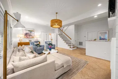 Walking downstairs you immediately arrive in our living area, perfect for late night conversations or just lounging.