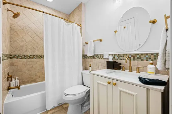 This bathroom is connected to the queen bedroom, with supplied shampoo, conditioner, and body wash.