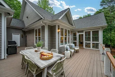 Our large deck area is perfect for outdoor entertaining and having a meal in nature.