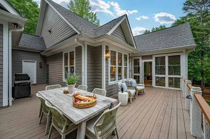 Our large deck area is perfect for outdoor entertaining and having a meal in nature.