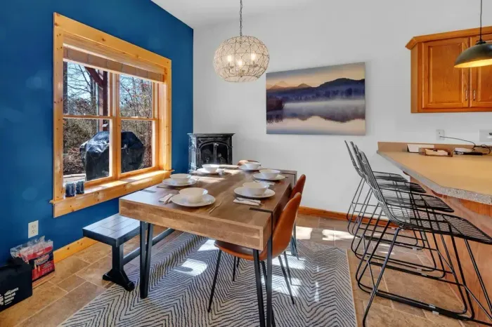Downstairs dining area with table for six and a space heater that really puts out the heat!
