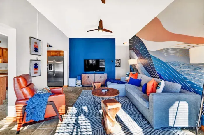 Enjoy together time in the downstairs living room on our Article sofa (w/bed) and watch TV, play games, or even practice yoga