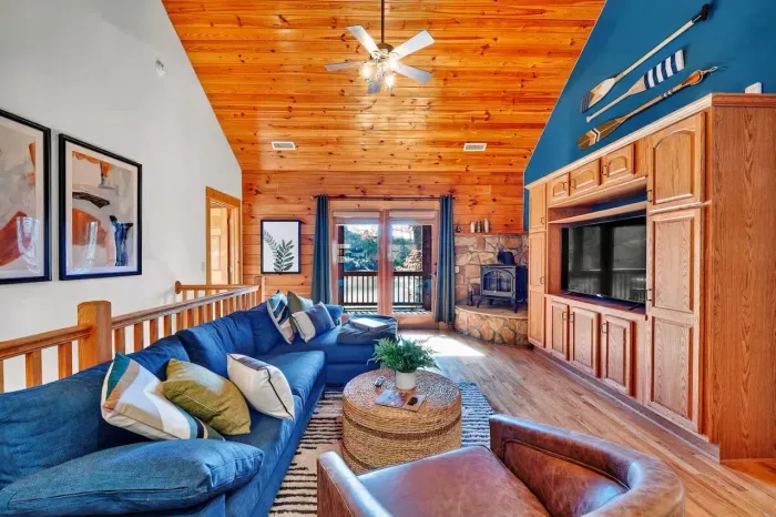 Relax with the family in our living room, enjoying the wood-burning stove-style heater, playing board games and sharing special times while overlooking the lake.