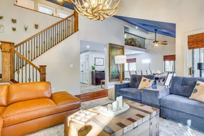 Living Room with Antler Chandelier and Upgraded Furniture