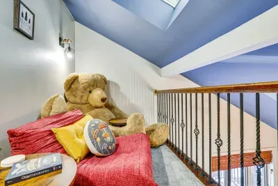 Pocono Pines vacation rental near Lake Naomi with cozy reading nook and rustic lodge decor