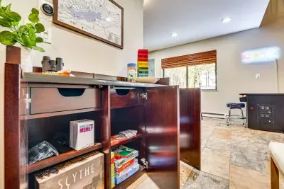 Board games and arcade game with tons of games to choose from located on ground floor.